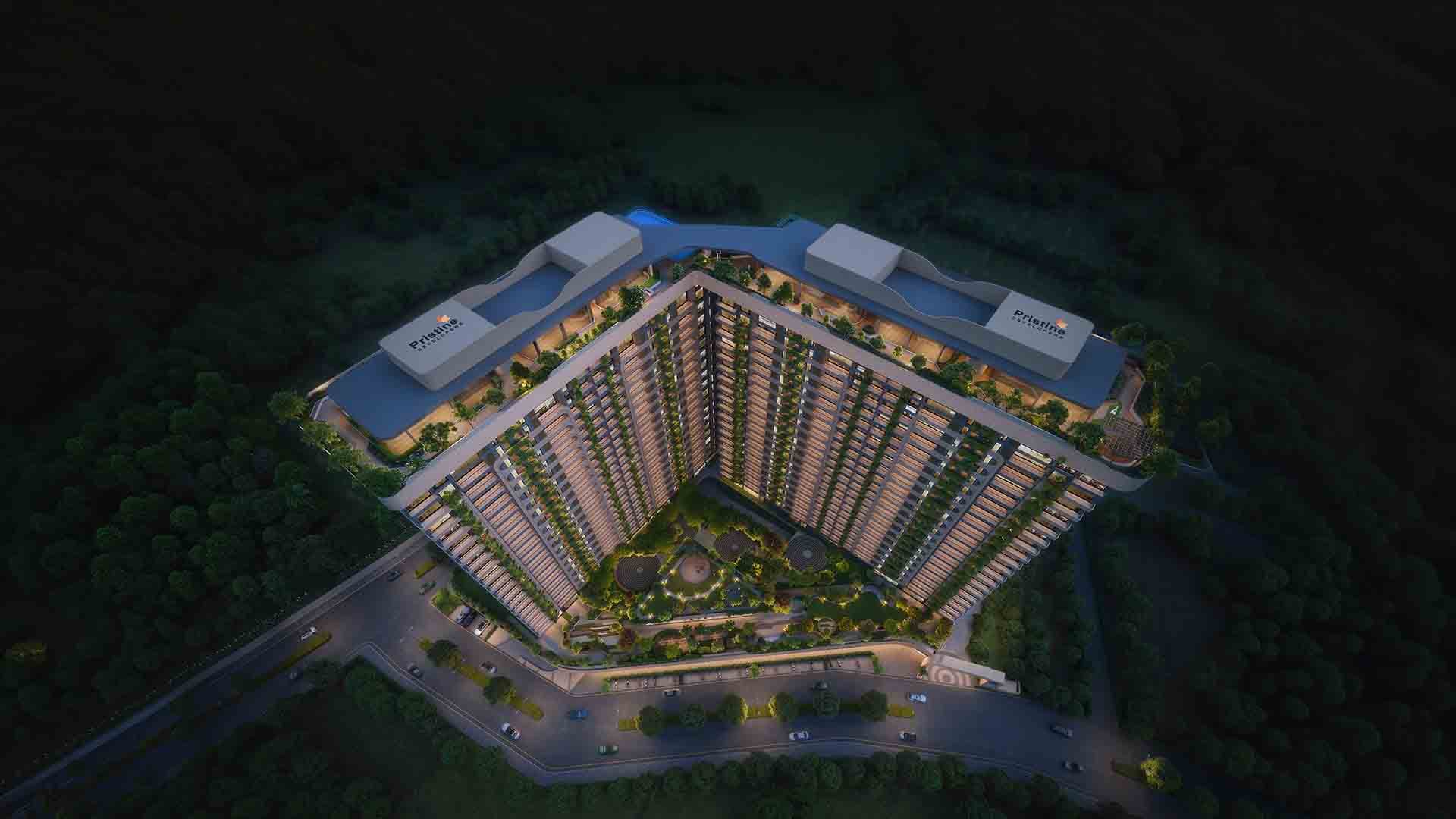 Pristine Amore night aerial with courtyard and pool